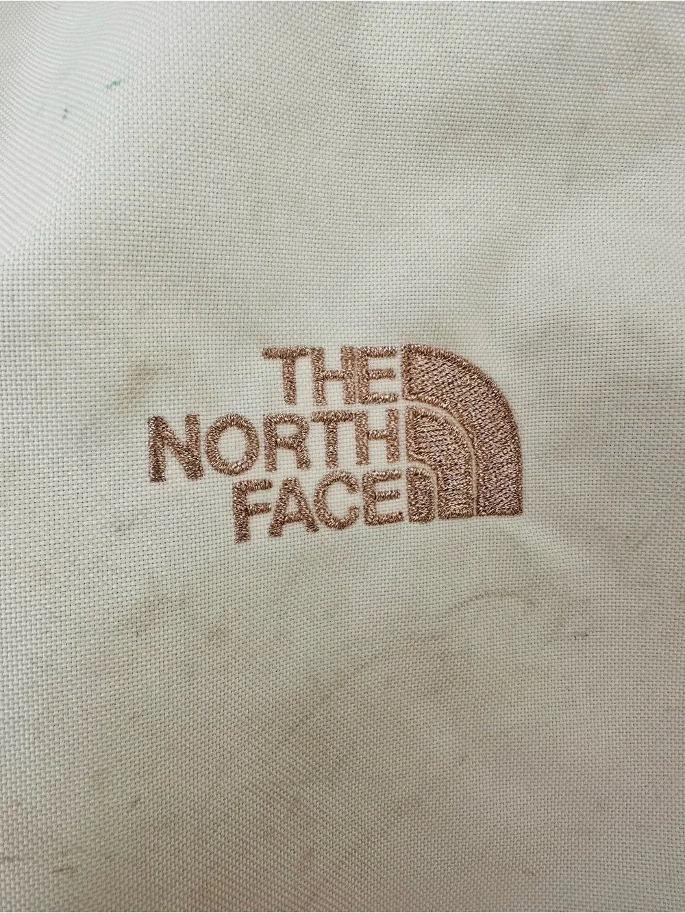 The North Face Jester Luxe Backpack in Cream with Rose Gold Accents